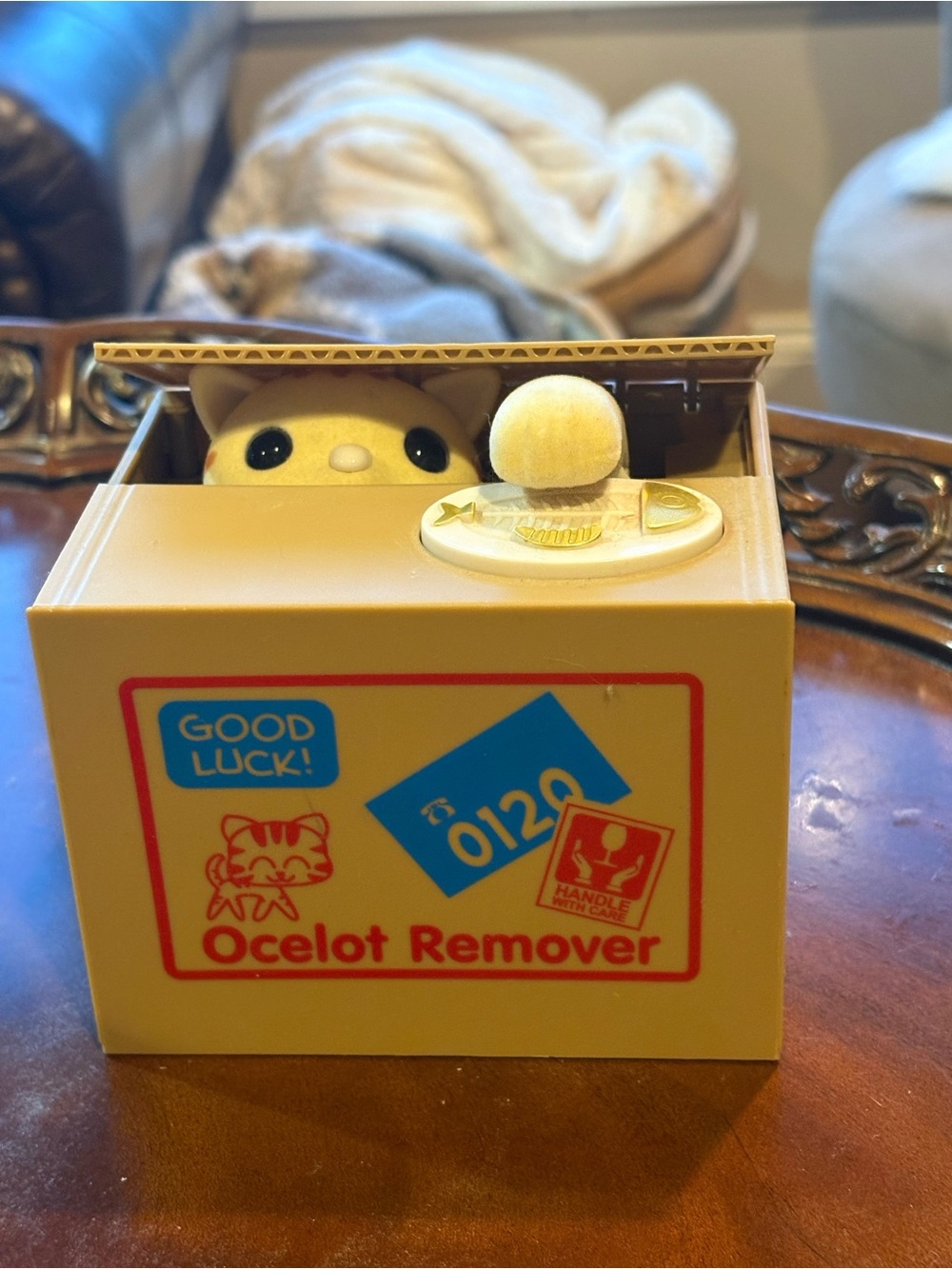 Ocelot Remover Coin Bank